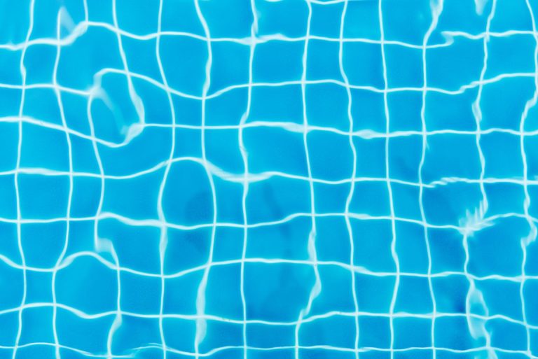 top view photography of blue pool tiles
